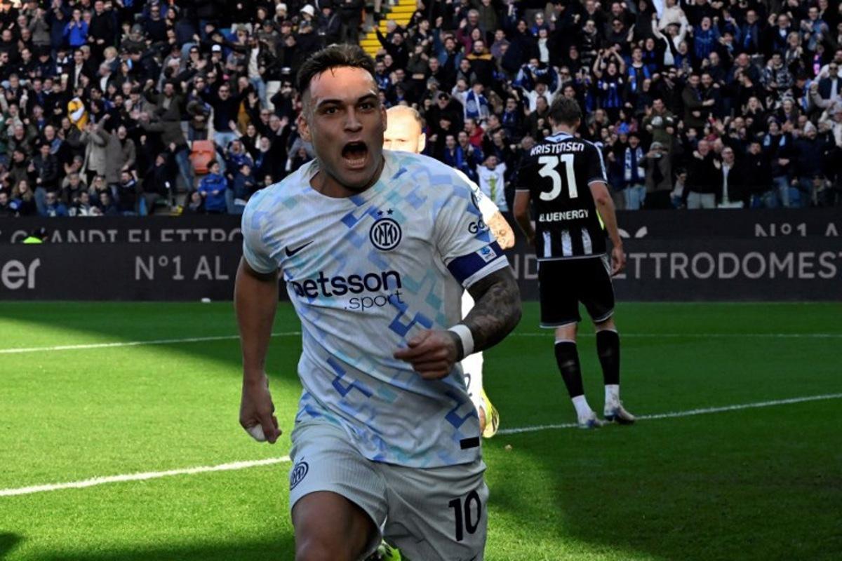 Inter Milan's Argentinian forward #10 Lautaro Martinez celebrates scoring his team's first goal during the Italian Serie A football match between Udinese and Inter Milan at the Friuli stadium in Udine on January 17, 2026. ANDREA PATTARO / AFP
