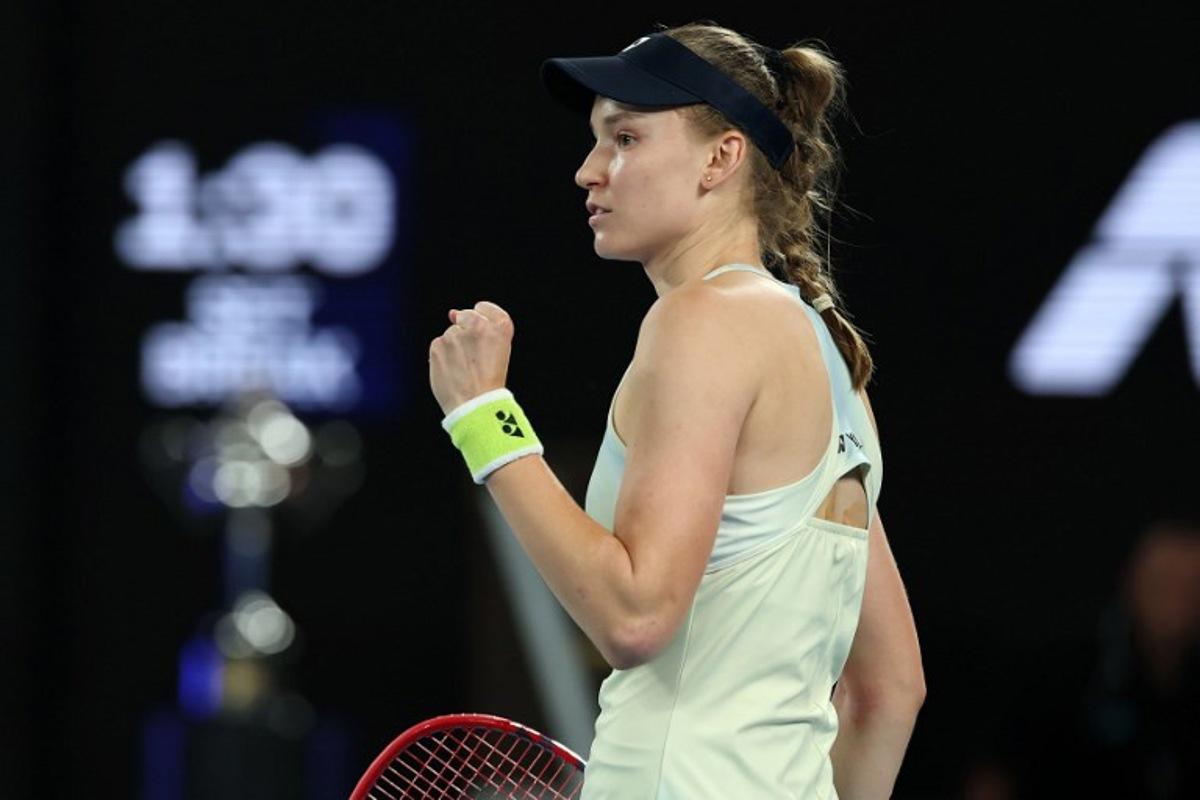 Kazakhstan's Elena Rybakina celebrates her first set against Belarus' Aryna Sabalenka during their women's singles final match on day fourteen of the Australian Open tennis tournament in Melbourne on January 31, 2026. Martin KEEP / AFP