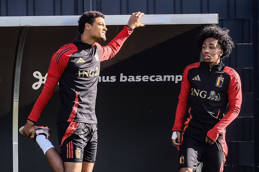 Belgium's Koni De Winter and Belgium's Malick Fofana pictured during a training session of the Belgian national soccer team Red Devils, at the Royal Belgian Football Association's training center, in Tubize, Tuesday 08 October 2024. The Red Devils are playing against Italy on Thursday, for the UEFA Nations League 2025. BELGA PHOTO BRUNO FAHY