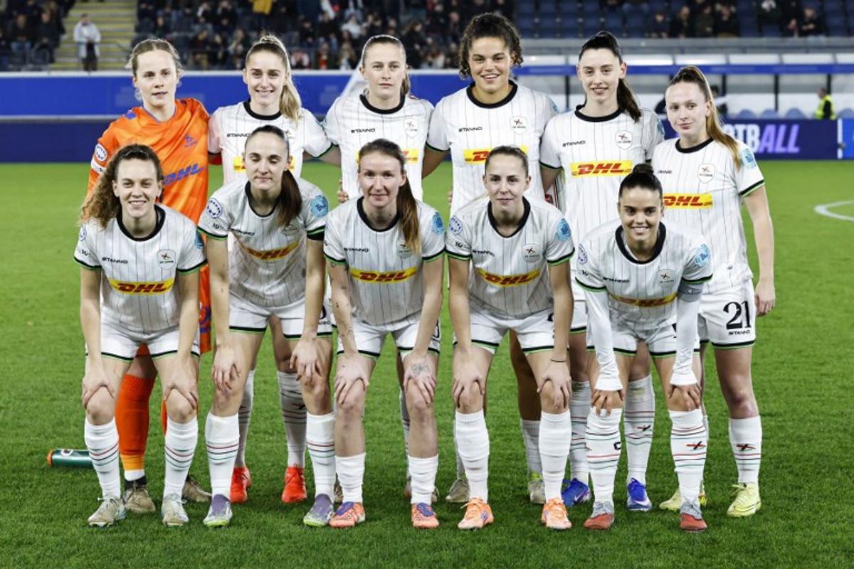 OH Leuven's players pose for a team photograph ahead of the UEFA Women's Champions League knockout play-off in first-leg match between Oud-Heverlee Leuven and Arsenal FC at the Den Dreef Stadium in Leuven on February 11, 2026. Simon Wohlfahrt / AFP