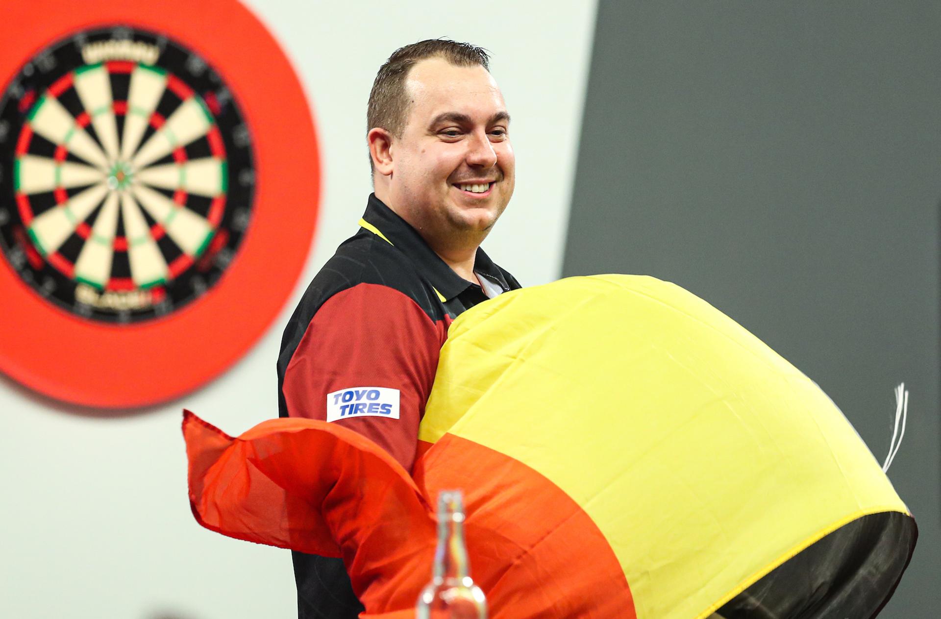 ATTENTION EDITORS - HAND OUT PICTURES - EDITORIAL USE WITH STORY ON DARTS WORLD CHAMPIONSHIPS ONLY - MANDATORY CREDIT KIERAN CLEEVES/PDC Hand out pictures released by PDC Professional Darts Corporation shows Belgian Kim Huybrechts celebrating after defeating Scottish Wright on day ten of the 2023 Cazoo World Darts Championship at Alexandra Palace, London, UK, on Tuesday 27 December 2022. MANDATORY CREDIT KIERAN CLEEVES/PDC