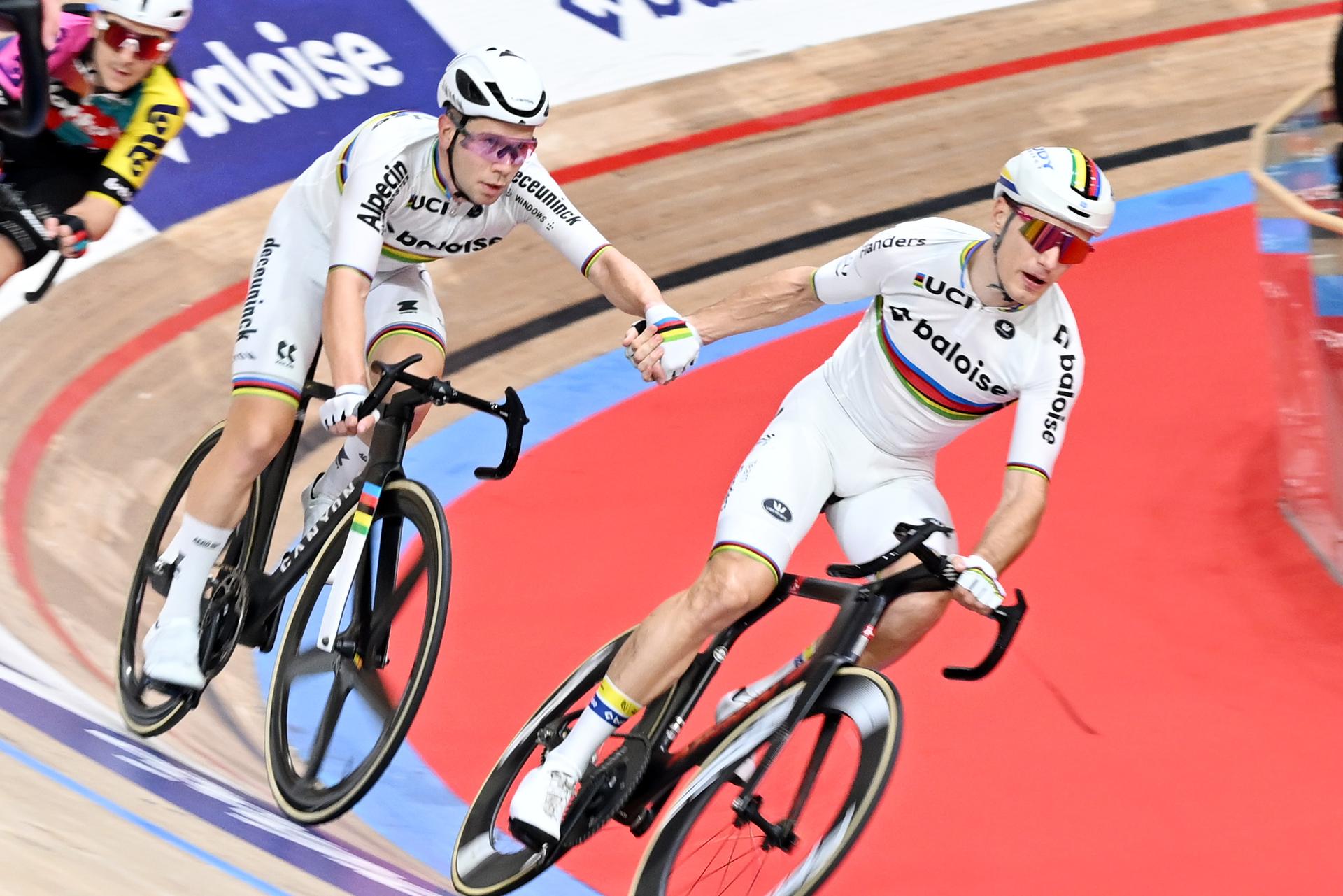 Belgian Fabio Van Den Bossche and Belgian Lindsay De Vylder pictured in action during the last day of the Zesdaagse Vlaanderen-Gent six-day indoor track cycling event at the indoor cycling arena 't Kuipke, Sunday 23 November 2025, in Gent. BELGA PHOTO MAARTEN STRAETEMANS