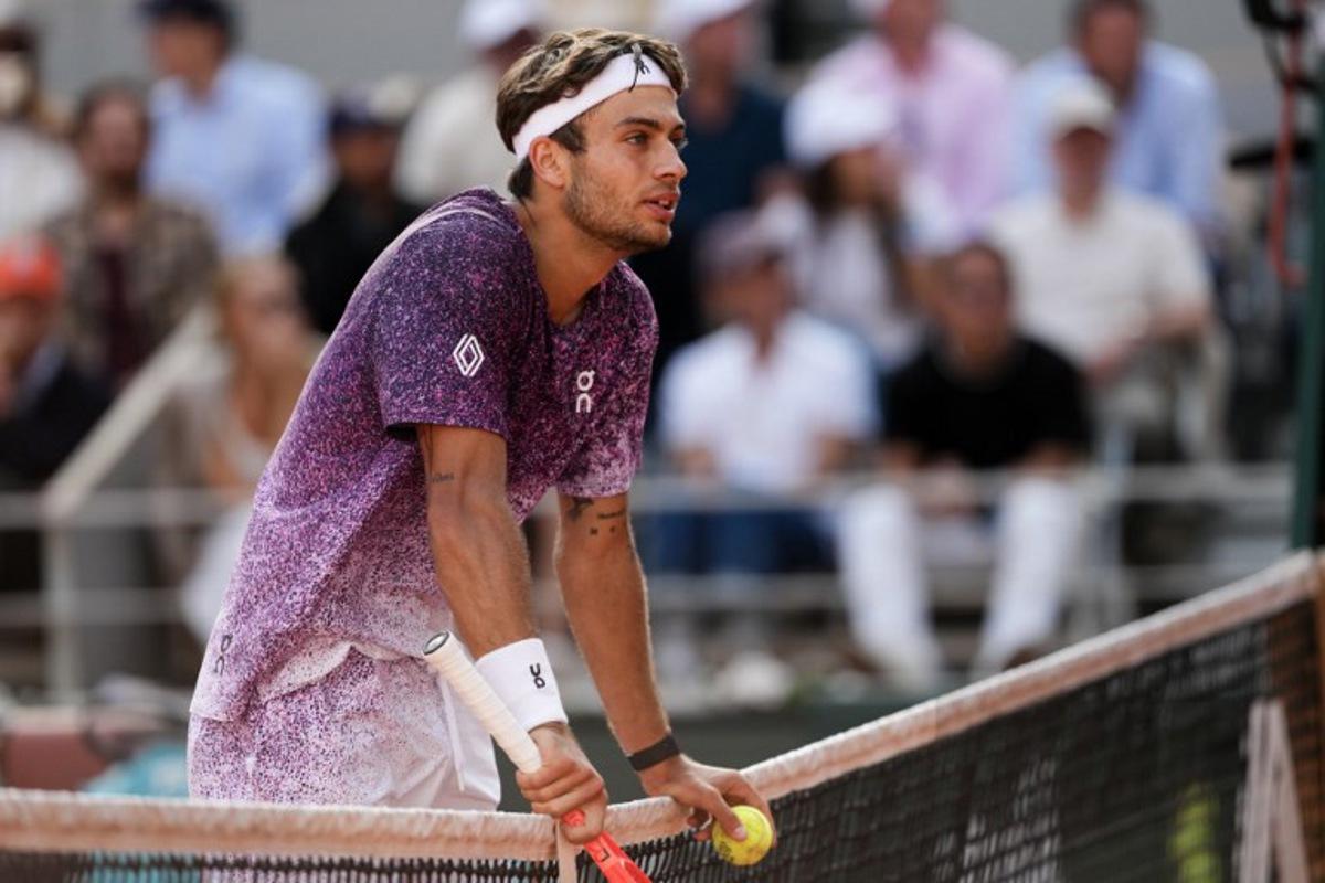 Italy's Flavio Cobolli reacts during his men's final singles match against Germany's Alexander Zverev on day 15 of the French Open tennis tournament on Court Philippe-Chatrier at the Roland-Garros Complex in Paris on June 7, 2026. Dimitar DILKOFF / AFP