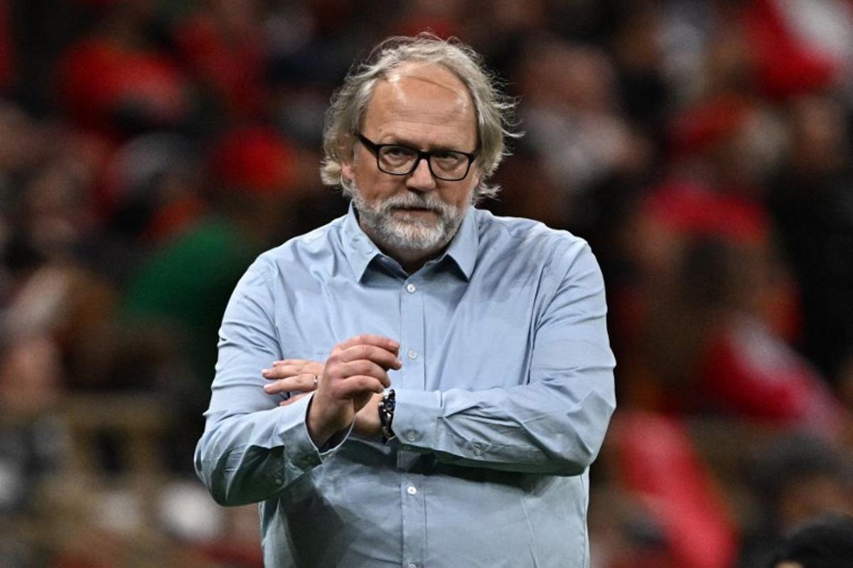 Mali's head coach Tom Saintfiet reacts after his team scored during the Africa Cup of Nations (CAN) Group A football match between Morocco and Mali at Prince Moulay Abdellah Stadium in Rabat on December 26, 2025. Gabriel BOUYS / AFP