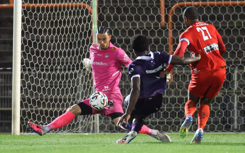 Olympic's goalkeeper Aitor Embela fights for the ball during a soccer game between RSCA Futures and Royal Olympic Charleroi, on Friday 17 April 2026 in Deinze, on day 34 of the 2025-2026 'Challenger Pro League' 1B second division of the Belgian championship. BELGA PHOTO VIRGINIE LEFOUR