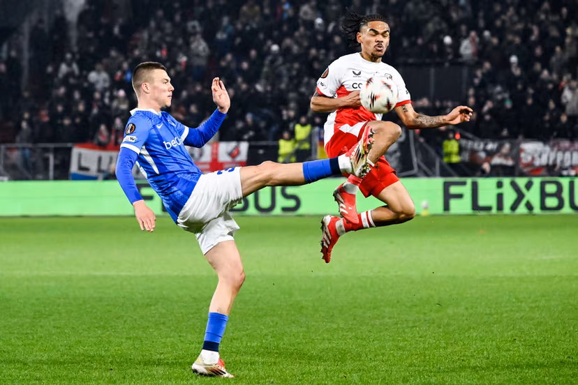 Genk's Daan Heymans and Utrecht's Alonzo Engwanda pictured in action during a soccer game between Dutch soccer club FC Utrecht and Belgian KRC Genk, on Thursday 22 January 2026 in Utrecht, Netherlands, the seventh game (out of 8) in the league phase of the UEFA Europa League competition. BELGA PHOTO TOM GOYVAERTS