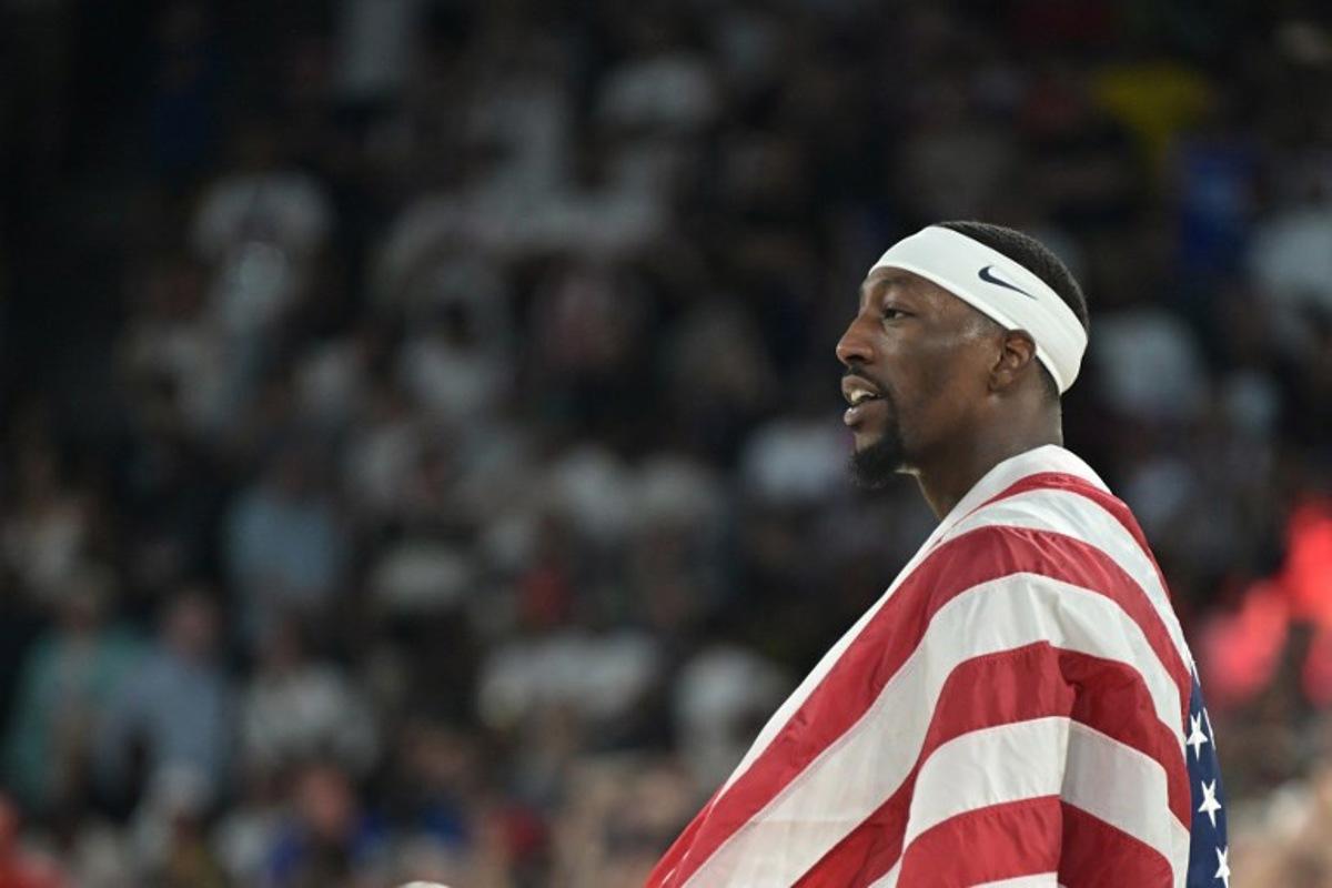 USA's #13 Bam Adebayo celebrates after the USA won the men's Gold Medal basketball match between France and USA during the Paris 2024 Olympic Games at the Bercy Arena in Paris on August 10, 2024. Damien MEYER / AFP