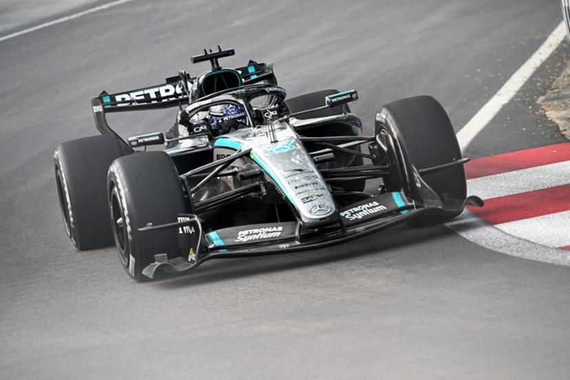 Mercedes' British driver George Russell drives during a practice session ahead of the Formula One Singapore Grand Prix at the Marina Bay Street Circuit in Singapore on October 9, 2026. Lillian SUWANRUMPHA / AFP