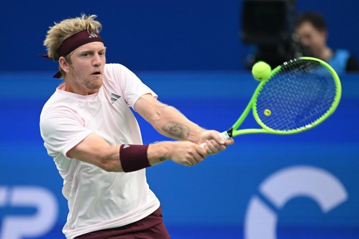 Spain's Alejandro Davidovich Fokina hits a return to Georgia's Nikoloz Basilashvili during their men's singles semi-final match at the Chengdu Open tennis tournament in Chengdu, in China's southwest Sichuan province on September 28, 2026. AFP
