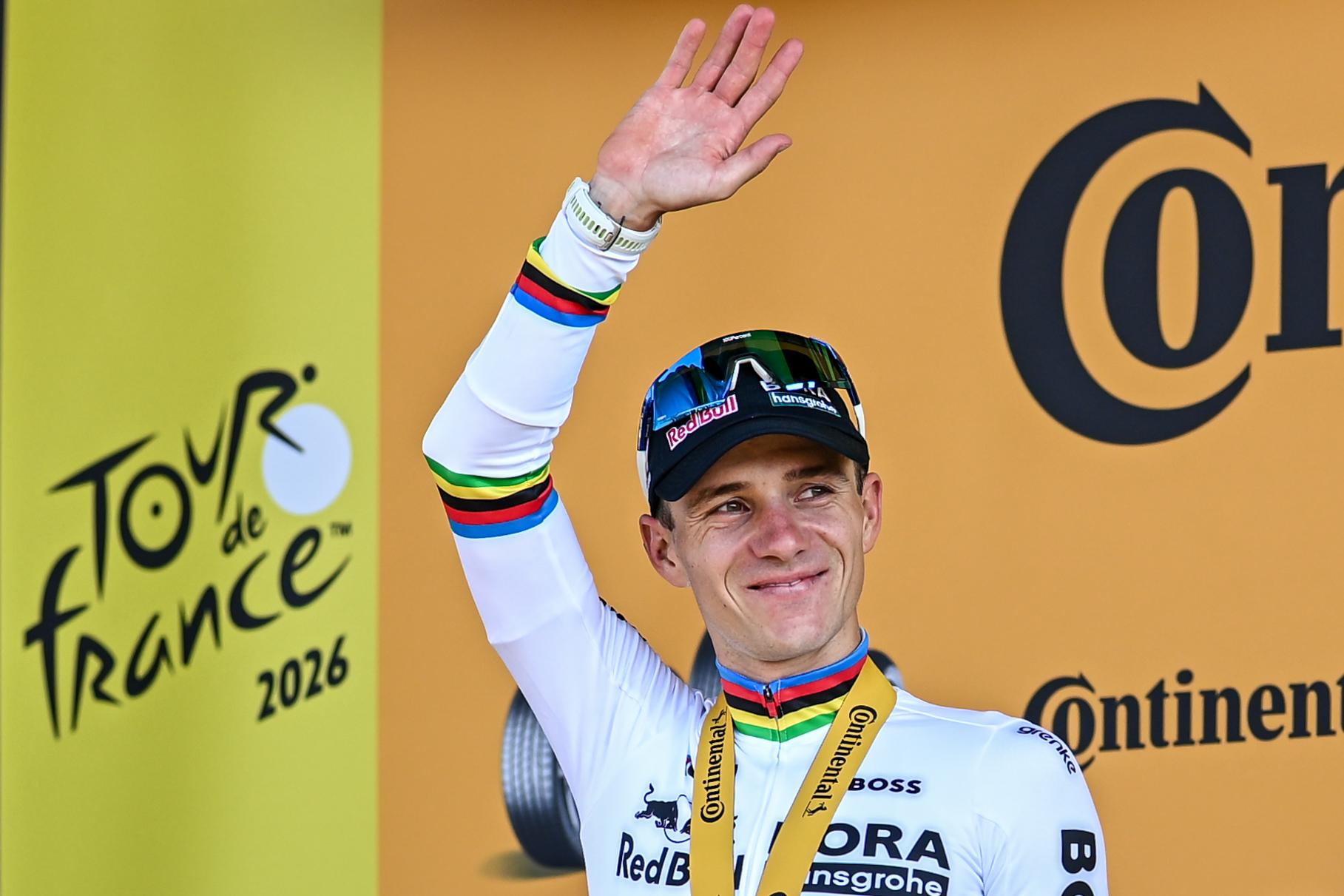 Belgian Remco Evenepoel of Red Bull-BORA-hansgrohe celebrates on the podium after winning the stage 16 of the 2026 Tour de France cycling race, an individual Time Trial stage of 26km from Evian-les-Bains to Thonon-les-Bains, on Tuesday 21 July 2026. The 113th edition of the Tour de France starts on Saturday 4 July in Barcelona, Spain, and will finish in Paris, France on the 26th of July. BELGA PHOTO DAVID PINTENS