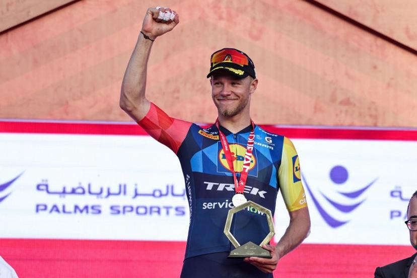 Jonathan Lidl-Trek's Italian rider Jonathan Milan reacts on the podium after winning the fourth stage of the UAE Tour cycling event in al-Fujairah on February 19, 2026. Fadel SENNA / AFP
