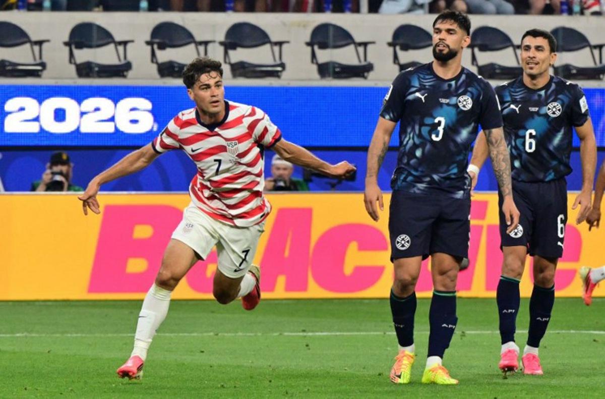 US midfielder #07 Giovanni Reyna celebrates scoring his team's fourth goal during the 2026 World Cup Group D football match between USA and Paraguay at the Los Angeles Stadium in Inglewood on June 12, 2026. Frederic J. BROWN / AFP