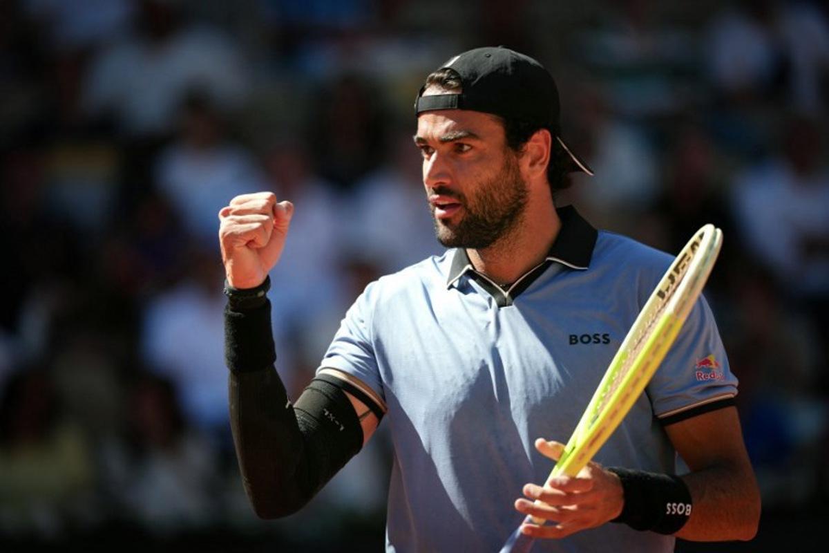 Italy's Matteo Berrettini reacts to a point against Argentina's Juan Manuel Cerundolo during their men's singles match on day 9 of the French Open tennis tournament on Court Suzanne-Lenglen at the Roland-Garros Complex in Paris on June 1, 2026. Dimitar DILKOFF / AFP