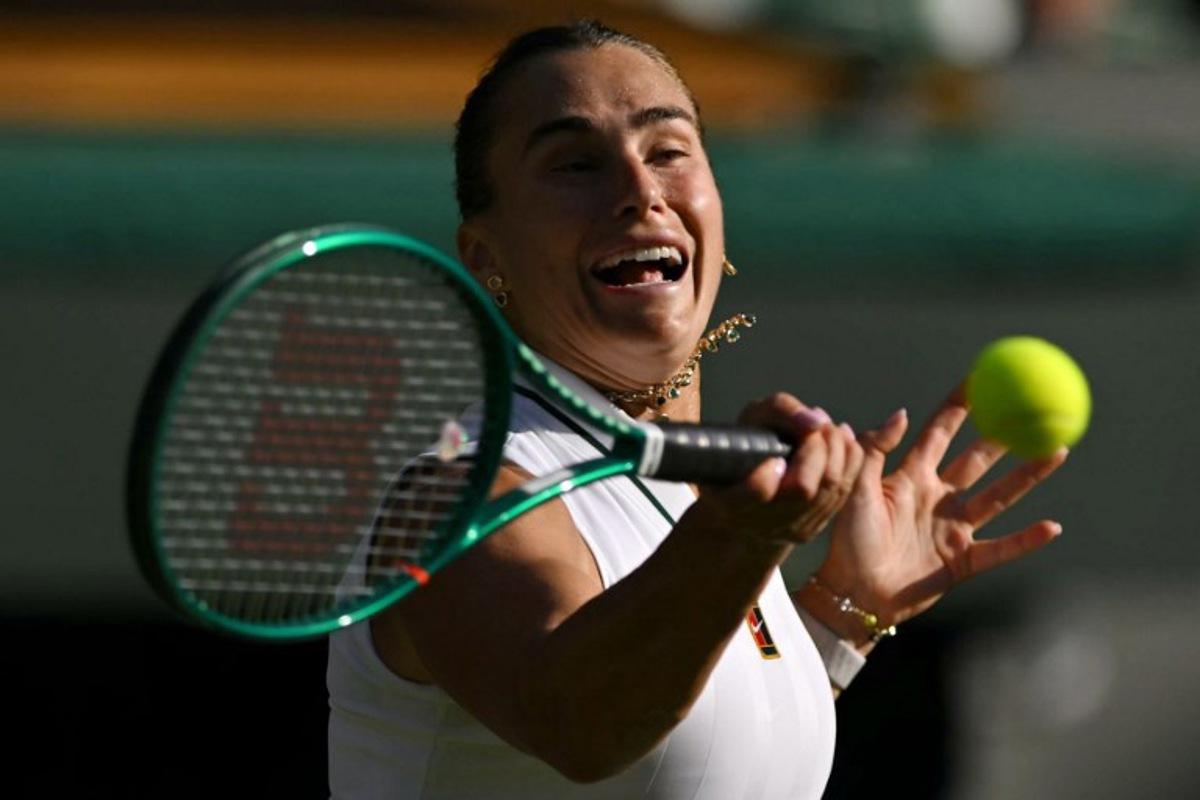 Belarus's Aryna Sabalenka returns to Latvia's Jelena Ostapenko during their women's singles third round tennis match on the fifth day of the 2026 Wimbledon Championships at The All England Lawn Tennis and Croquet Club in Wimbledon, southwest London, on July 3, 2026. Glyn KIRK / AFP