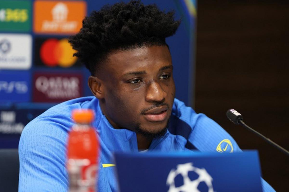 Tottenham Hotspur's Ghanian striker #20 Mohammed Kudus attends a press conference at the Tottenham training centre in Enfield, north London, on December 8, 2025, on the eve of their UEFA Champions League league phase football match against Slavia Prague. Toby Shepheard / AFP