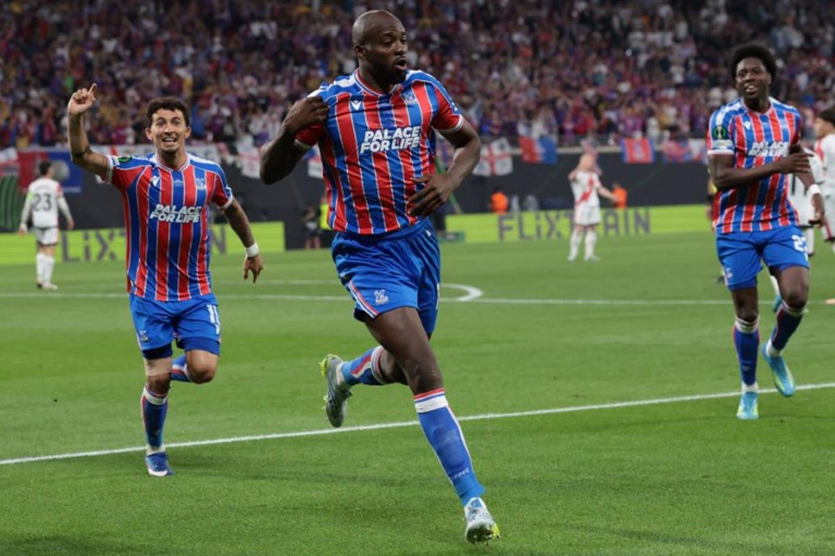 Crystal Palace's French striker #14 Jean-Philippe Mateta (C) celebrates scoring the opening goal 1-0 followed by Crystal Palace's Spanish midfielder #10 Yeremy Pino (L) during the UEFA Conference League final football match between Crystal Palace FC and Rayo Vallecano de Madrid in Leipzig, Germany, on May 27, 2026. Ronny HARTMANN / AFP