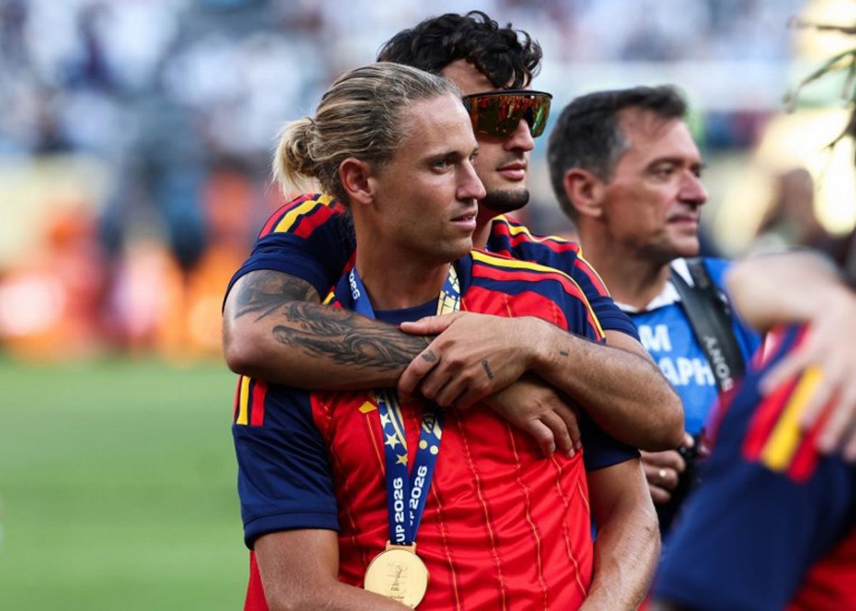 Spain's midfielder #05 Marcos Llorente (in front) and defender #02 Marc Pubill hug after winning the 2026 World Cup football tournament final match between Spain and Argentina at the New York/New Jersey Stadium in East Rutherford on July 19, 2026. FRANCK FIFE / AFP