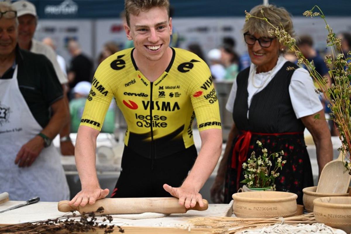 British rider Matthew Brennan of team Visma Lease a Bike attends the team presentation on the eve of the first stage of the Tour of Switzerland (Tour de Suisse) cycling race, in Sondrio, Italy, on June 16, 2026. Marco BERTORELLO / AFP
