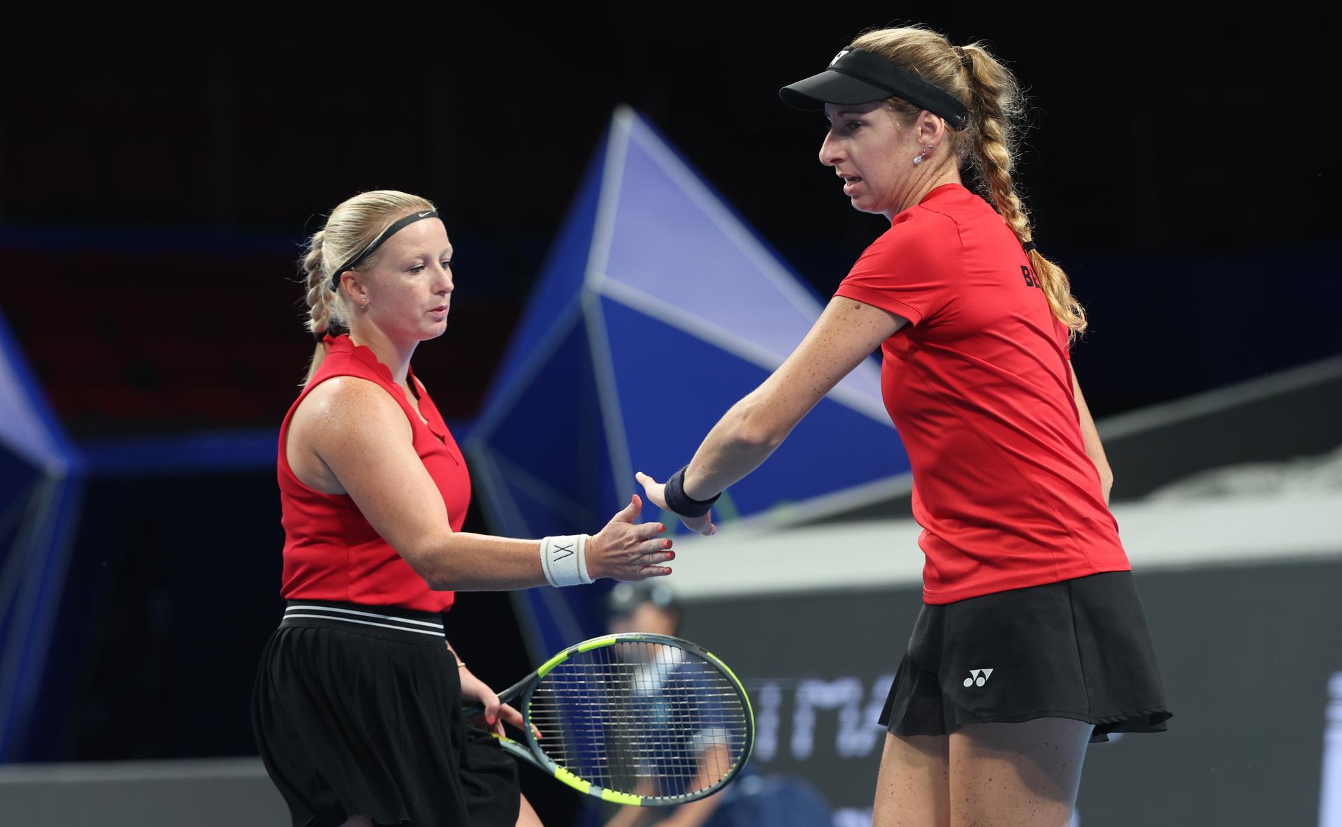 Belgian Lara Salden and Belgian Magali Kempen pictured during a doubles tennis match between Ukrainian pair Kalinina/Kichenok and Belgian pair Kempen/Salden, the third rubber in the tie between Belgium and Ukraine in the Quarter Finals of the Billie King Cup tournament, on Thursday 24 September 2026 in Shenzhen, China. BELGA PHOTO VIRGINIE LEFOUR