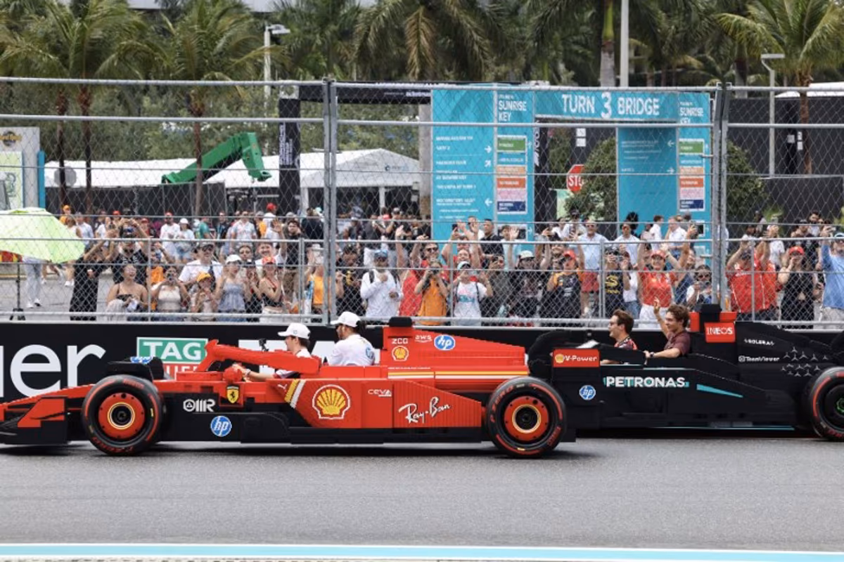 (L-R) Ferrari's Monegasque driver Charles Leclerc, Ferrari's British driver Lewis Hamilton, Mercedes' British driver George Russell and Mercedes' Italian driver Andrea Kimi Antonelli ride in Lego cars during the Driver's Parade before the 2025 Miami Formula One Grand Prix at Miami International Autodrome in Miami Gardens, Florida, on May 4, 2025. CHARLY TRIBALLEAU / AFP