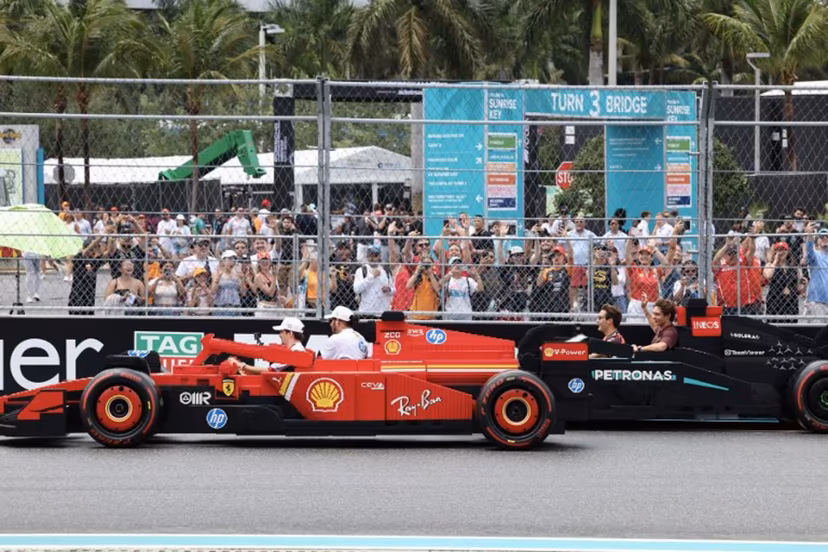 (L-R) Ferrari's Monegasque driver Charles Leclerc, Ferrari's British driver Lewis Hamilton, Mercedes' British driver George Russell and Mercedes' Italian driver Andrea Kimi Antonelli ride in Lego cars during the Driver's Parade before the 2025 Miami Formula One Grand Prix at Miami International Autodrome in Miami Gardens, Florida, on May 4, 2025. CHARLY TRIBALLEAU / AFP