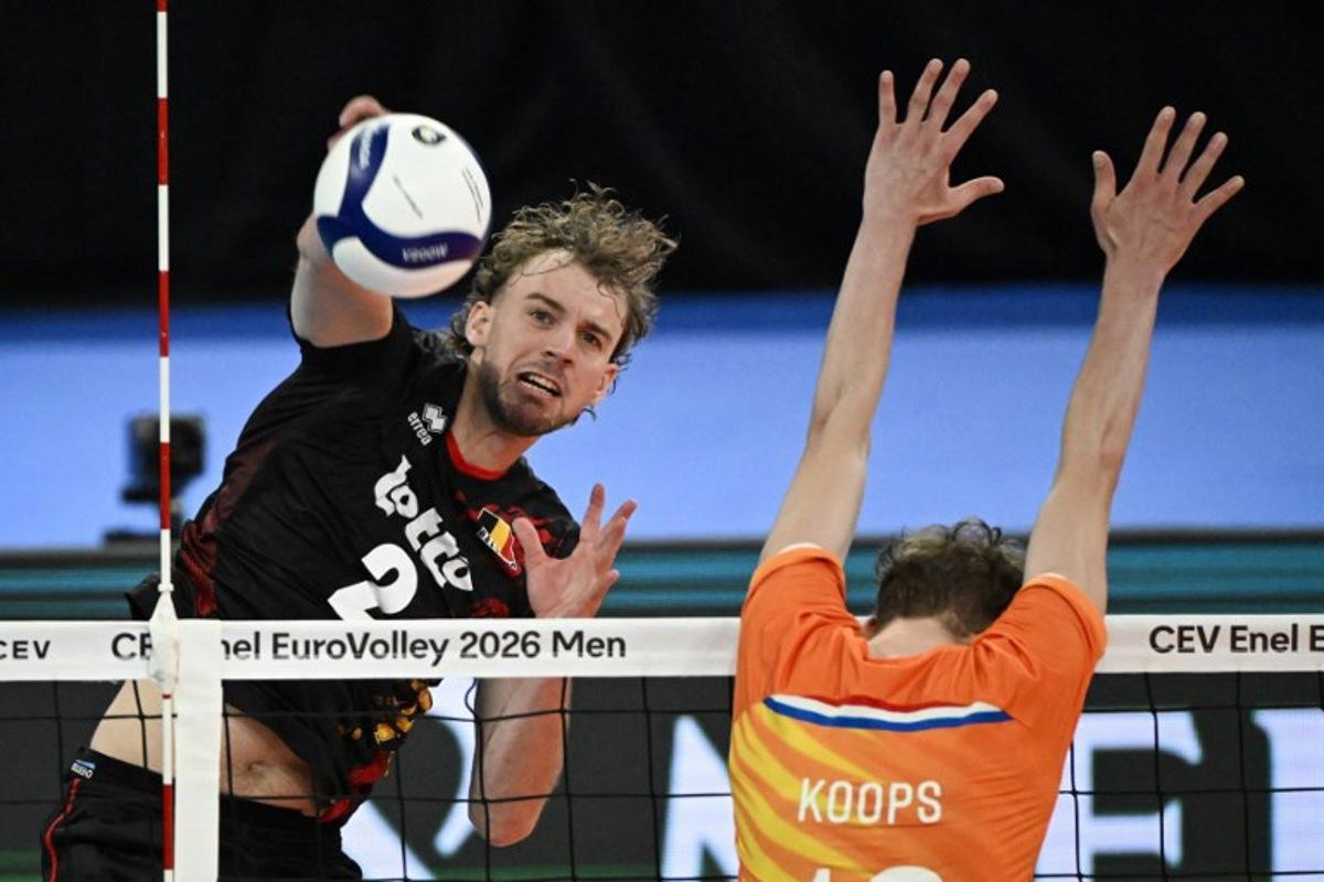 Belgium's Ferre Reggers and Netherlands' Tom Koops play the ball during the men's volleyball European Championships Pool C match Netherland vs Belgium in Tampere, Finland, on September 11, 2026. Emmi Korhonen / Lehtikuva / AFP