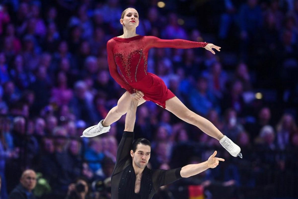 Germany's Minerva Fabienne Hase and Nikita Volodin perform during the pairs short program of the 2026 ISU Figure Skating World Championships in Prague on March 25, 2026. Michal Cizek / AFP