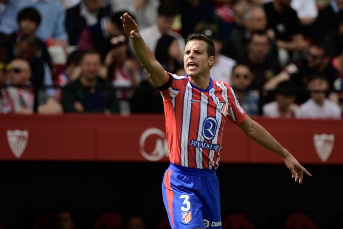 Atletico Madrid's Spanish defender #03 Cesar Azpilicueta gestures during the Spanish league football match between Sevilla FC and Club Atletico de Madrid at the Ramon Sanchez Pizjuan stadium in Seville on April 6, 2025. CRISTINA QUICLER / AFP