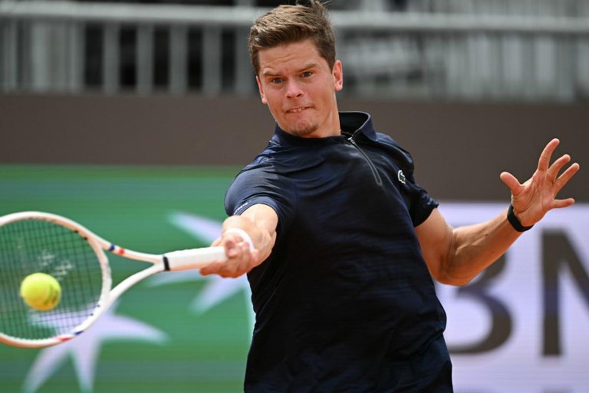 Belgium's Alexander Blockx returns the ball to Italy's Federico Cina during the ATP Rome Open tennis tournament at Foro Italico in Rome on May 7, 2026. Tiziana FABI / AFP