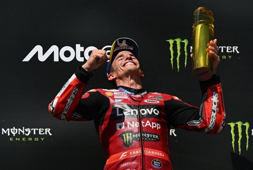 Team Ducati Lenovo Team's Marc Marquez celebrates on the podium after winning the MotoGP Grand Prix of Czechia in Brno, Czech Republic, on June 21, 2026. Michal Cizek / AFP