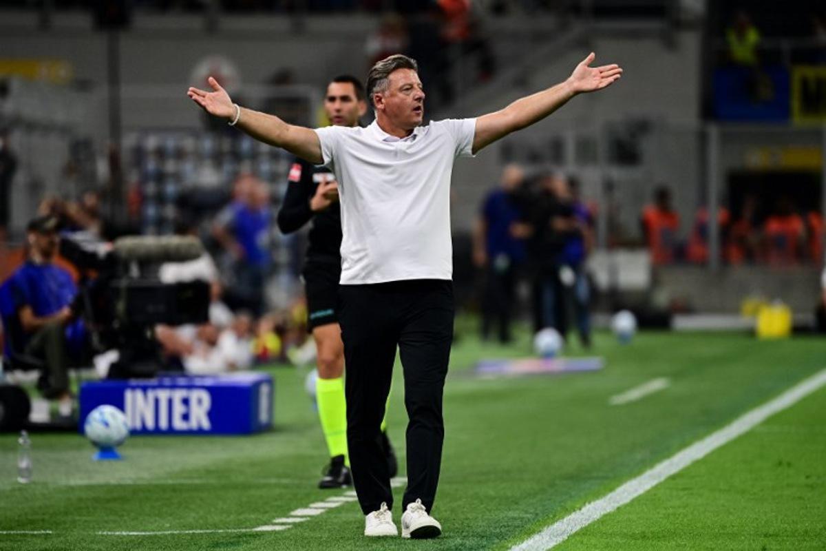 Udinese's head coach Kosta Runjaic reacts during the Italian Serie A football match between Inter Milan and Udinese at the San Siro Stadium in Milan, Italy on September 14, 2026. Piero CRUCIATTI / AFP