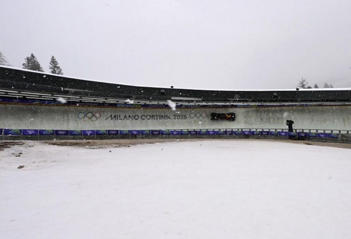 Belgium's Kelly van Petegem takes part in the bobsleigh women's monobob training session at Cortina Sliding Centre during the Milano Cortina 2026 Winter Olympic Games in Cortina d'Ampezzo on February 14, 2026. Stefano RELLANDINI / AFP