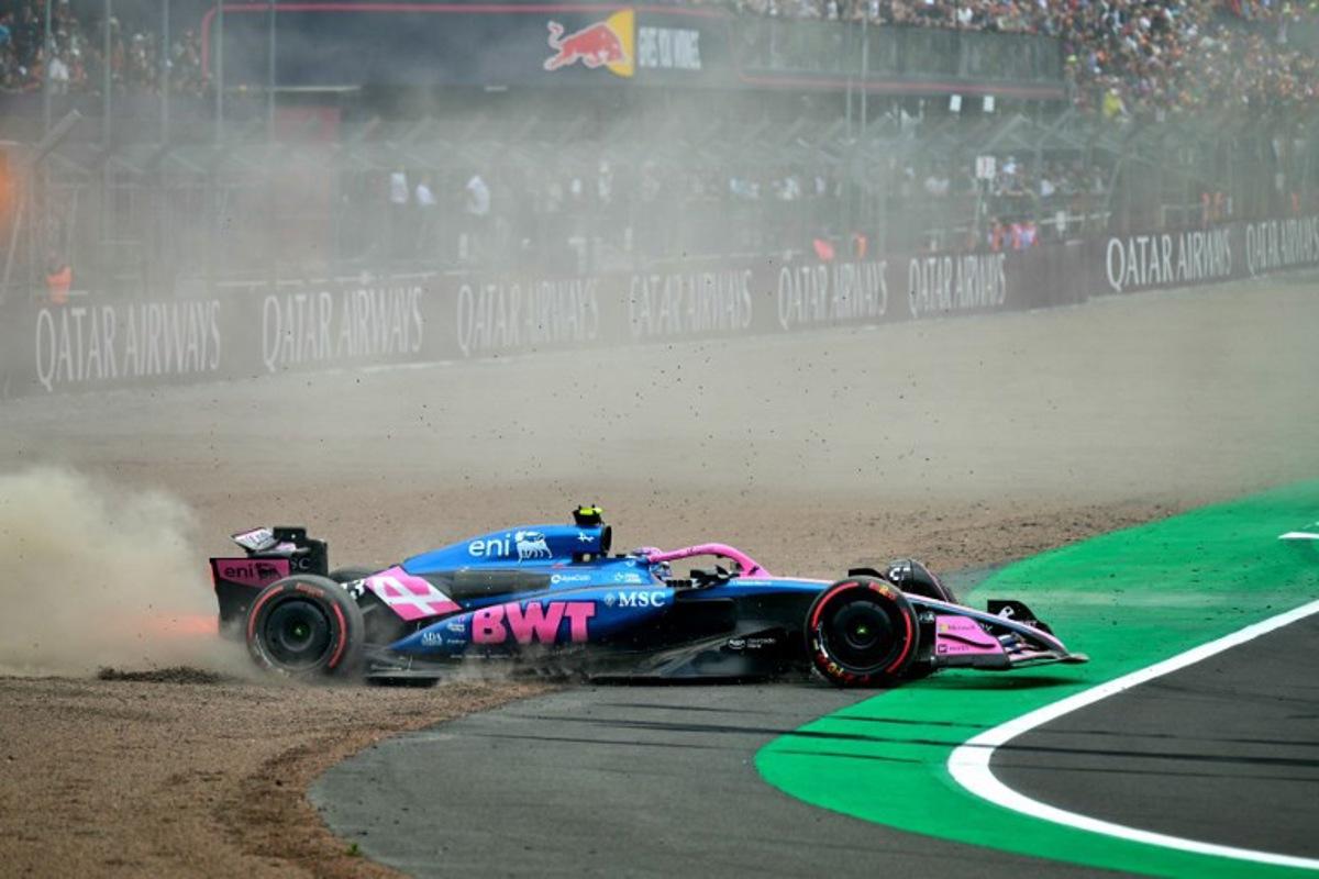 Alpine's Argentinian driver Franco Colapinto spins out into the gravel during the qualifying session ahead of the Formula One British Grand Prix at the Silverstone motor racing circuit in Silverstone, central England, on July 5, 2025. Andrej ISAKOVIC / AFP