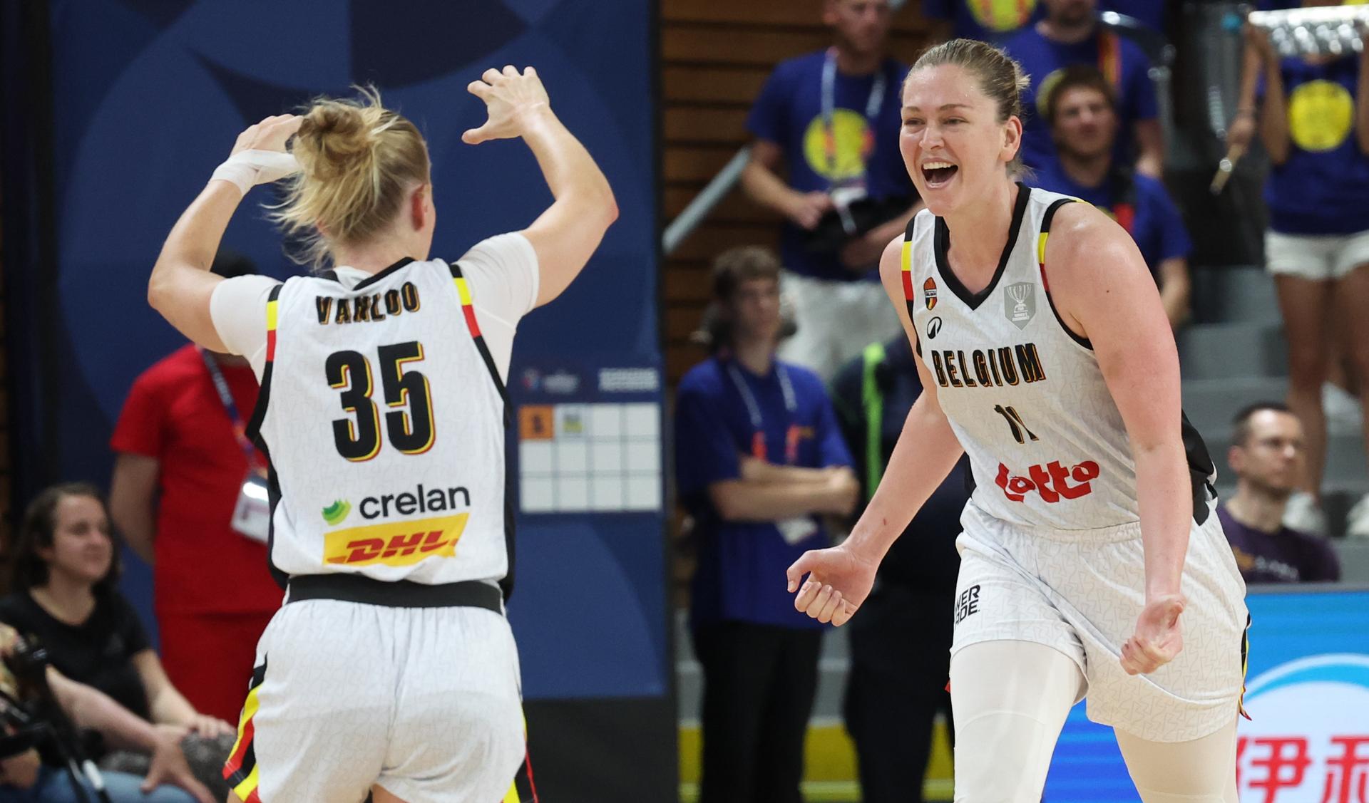 Belgium's Julie Vanloo and Belgium's Emma Meesseman celebrate during the third game and the last in the group stage (group C) between Belgian national women team 'the Belgian Cats' and Czech Republic national team, in Brno, Czech Republlic, on Sunday 22 June 2025, at the FIBA Women's EuroBasket 2025. BELGA PHOTO VIRGINIE LEFOUR