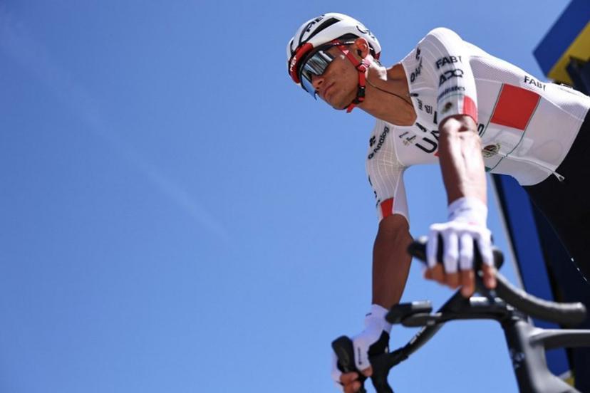 UAE Team Emirates XRG's Mexican rider Isaac Del Toro Romero awaits the start of the 7th stage of the Tour Auvergne-Rhone-Alpes cycling race (formerly known as the Criterium du Dauphine), 133,6km between La Bridoire and Grand Colombier in the French Alps on June 13, 2026. Anne-Christine POUJOULAT / AFP