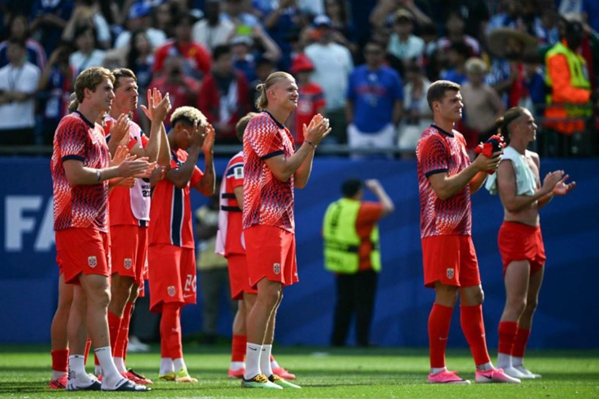 Norway's forward #09 Erling Braut Haaland (C) gestures at the end of the 2026 World Cup Group I football match between Norway and France at the Boston Stadium in Foxborough on June 26, 2026. MAURO PIMENTEL / AFP