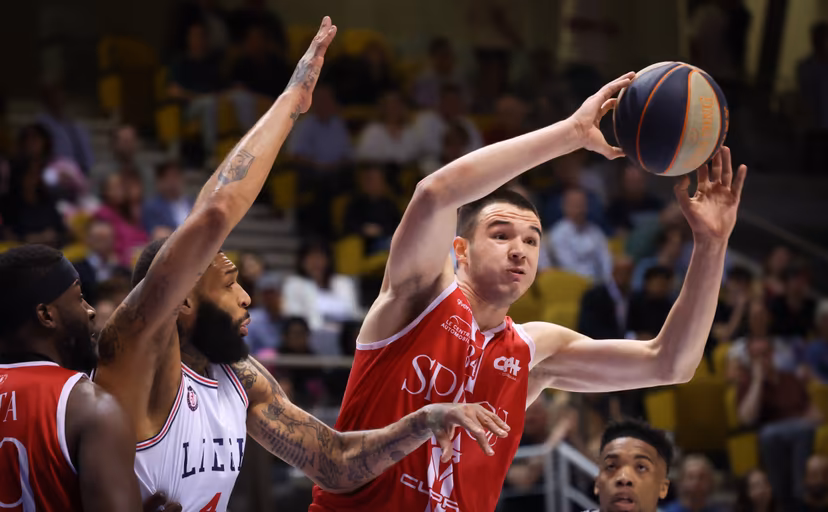 Liege's Jamelle Hagins and Spirou's Bine Prepelic fight for the ball during a basketball match between RSW Liege Basket and Spirou Charleroi, Friday 10 May 2024 in Liege, game 2 (best of 3) in the Belgian Play-offs quarter-finals phase of the 'BNXT League' Belgian and Netherlands first division basket championship. BELGA PHOTO VIRGINIE LEFOUR