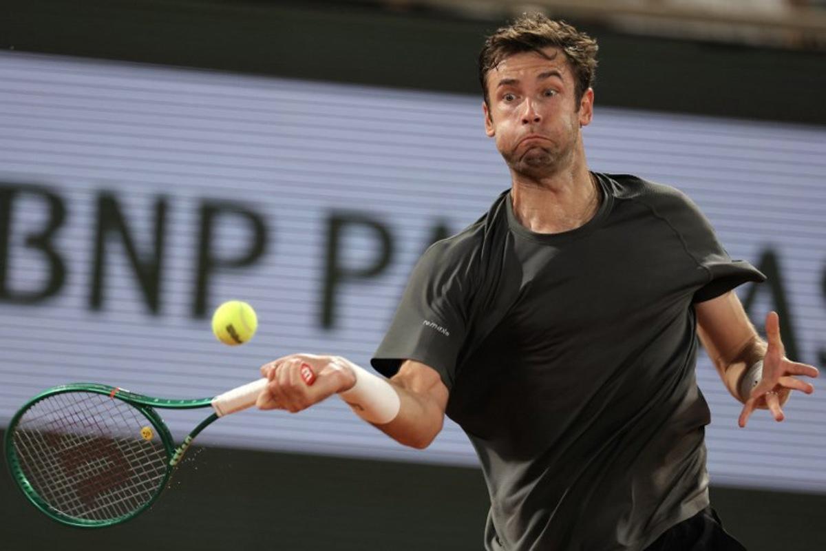 France's Quentin Halys plays a forehand return to Germany's Alexander Zverev during their men's singles match on day 6 of the French Open tennis tournament on Court Philippe-Chatrier at the Roland-Garros Complex in Paris on May 29, 2026. Thomas SAMSON / AFP