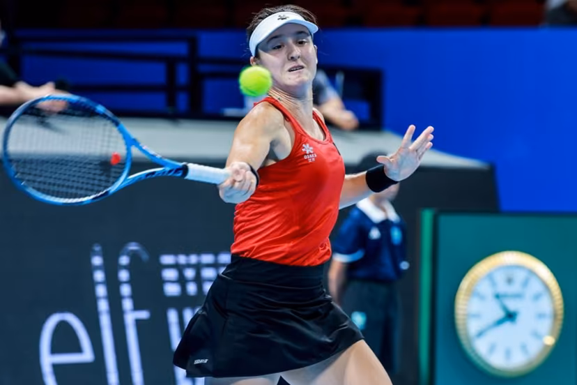 Belgium's Jana Otzipka hits a return to Ukraine's Anhelina Kalinina during their women's singles quarter-final match at the Billie Jean King Cup tennis tournament in Shenzhen, southern China's Guangdong province on September 24, 2026. CN-STR / AFP