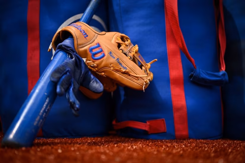 The glove and bat of Chicago Cubs' Nico Hoerner are pictured prior to the first of the two-game, 2023 major league baseball London Series between the St. Louis Cardinals and the Chicago Cubs at London Stadium in east London on June 24, 2023. Ben Stansall / AFP