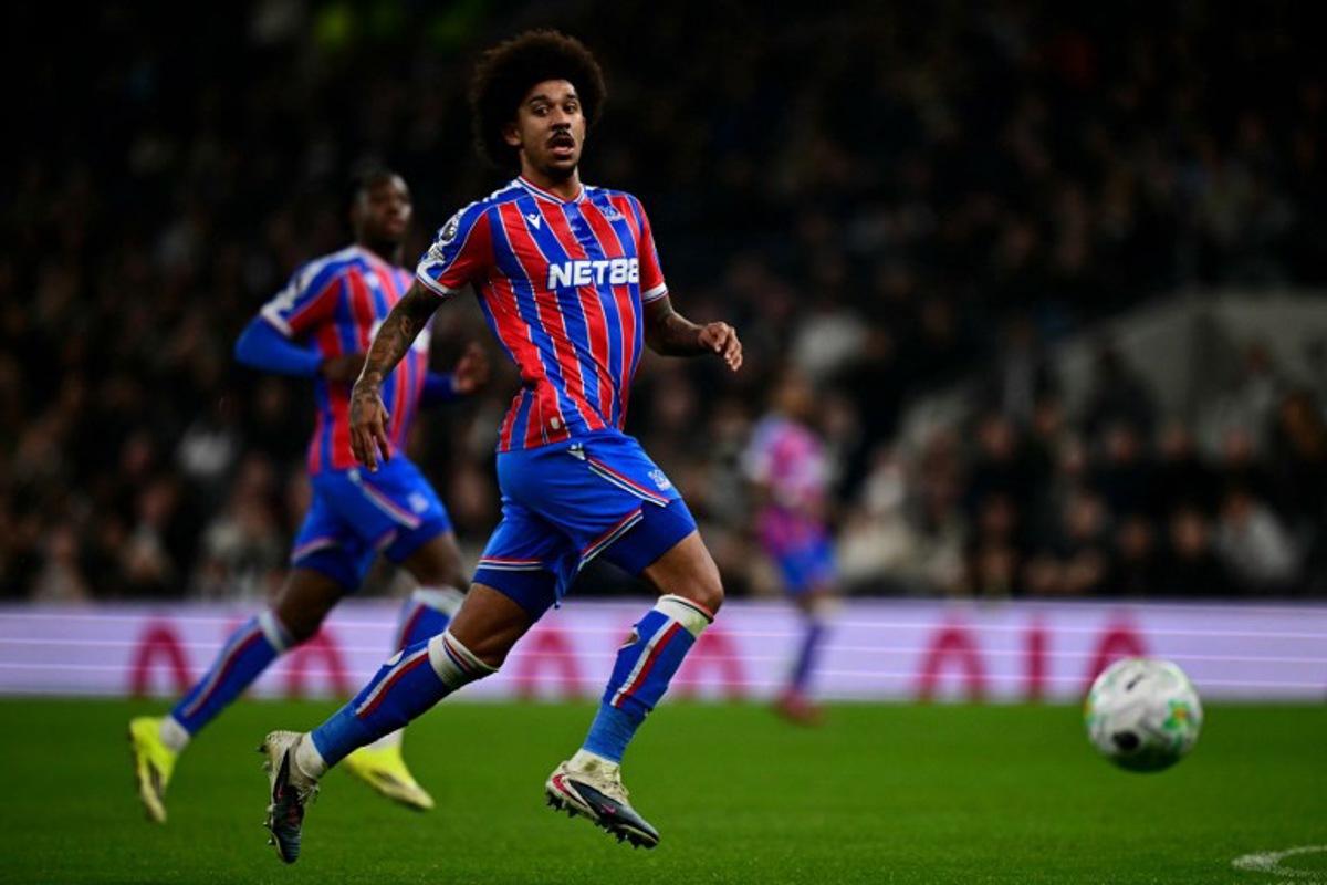 Crystal Palace's US defender #26 Chris Richards runs with the ball during the English Premier League football match between Tottenham Hotspur and Crystal Palace at the Tottenham Hotspur Stadium in London, on March 5, 2026. Ben STANSALL / AFP