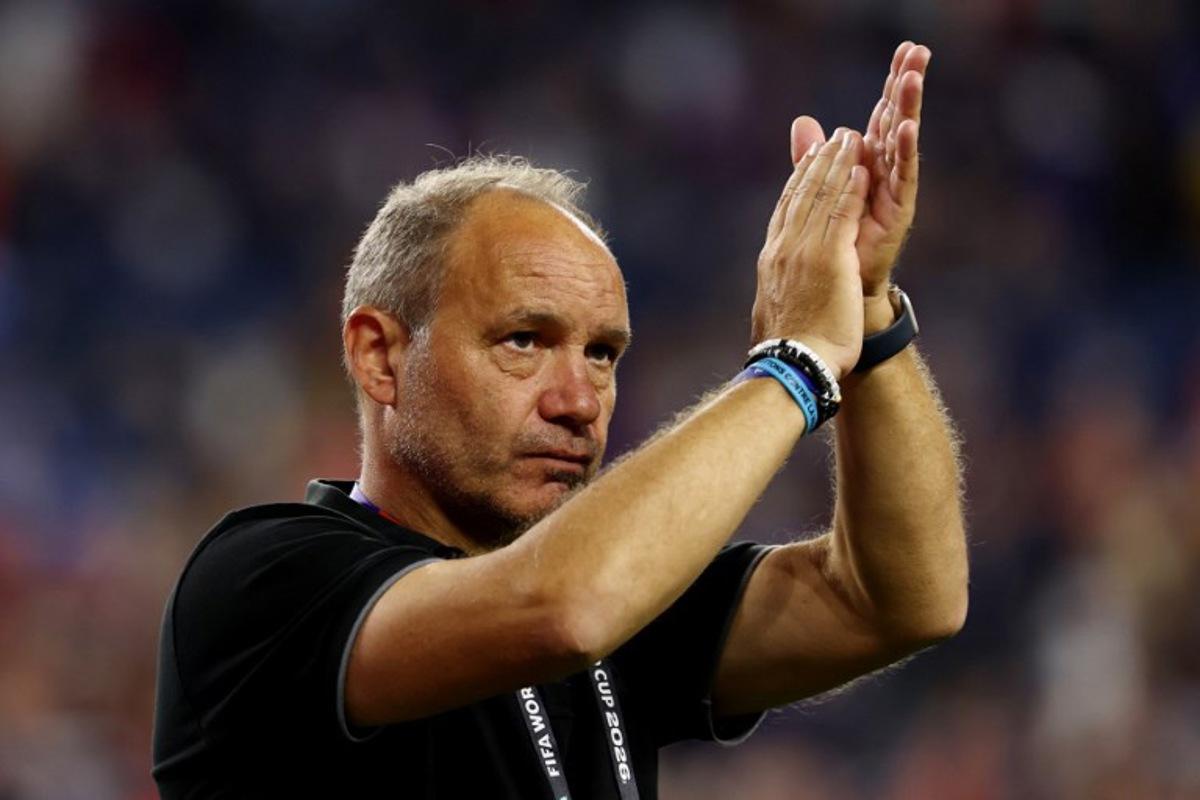 Haiti's French head coach Sebastien Migne acknowledges the crowd after losing the 2026 World Cup Group C football match between Haiti and Scotland at the Boston Stadium in Foxborough on June 13, 2026. FRANCK FIFE / AFP