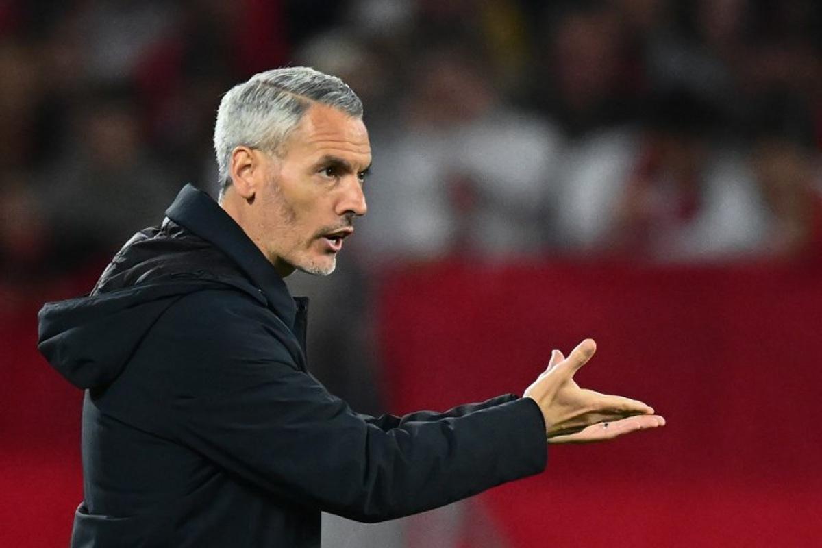 Sporting Braga's Spanish head coach Carlos Vicens reacts during the UEFA Europa League semi-final second leg football match between SC Freiburg and SC Braga in Freiburg im Breisgau, southwestern Germany on May 7, 2026. Silas STEIN / AFP