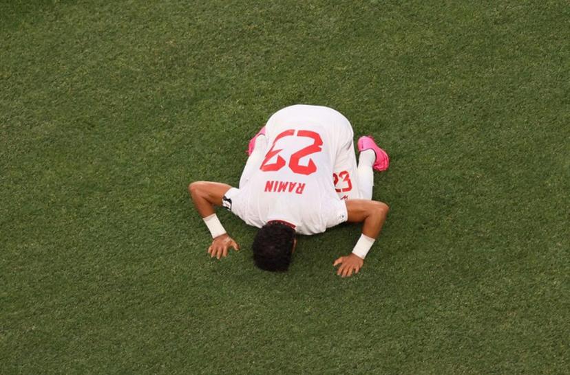 Iran's defender #23 Ramin Rezaeian celebrates scoring his team's first goal during the 2026 World Cup Group G football match between Iran and New Zealand at Los Angeles Stadium in Inglewood on June 15, 2026. Etienne Laurent / AFP