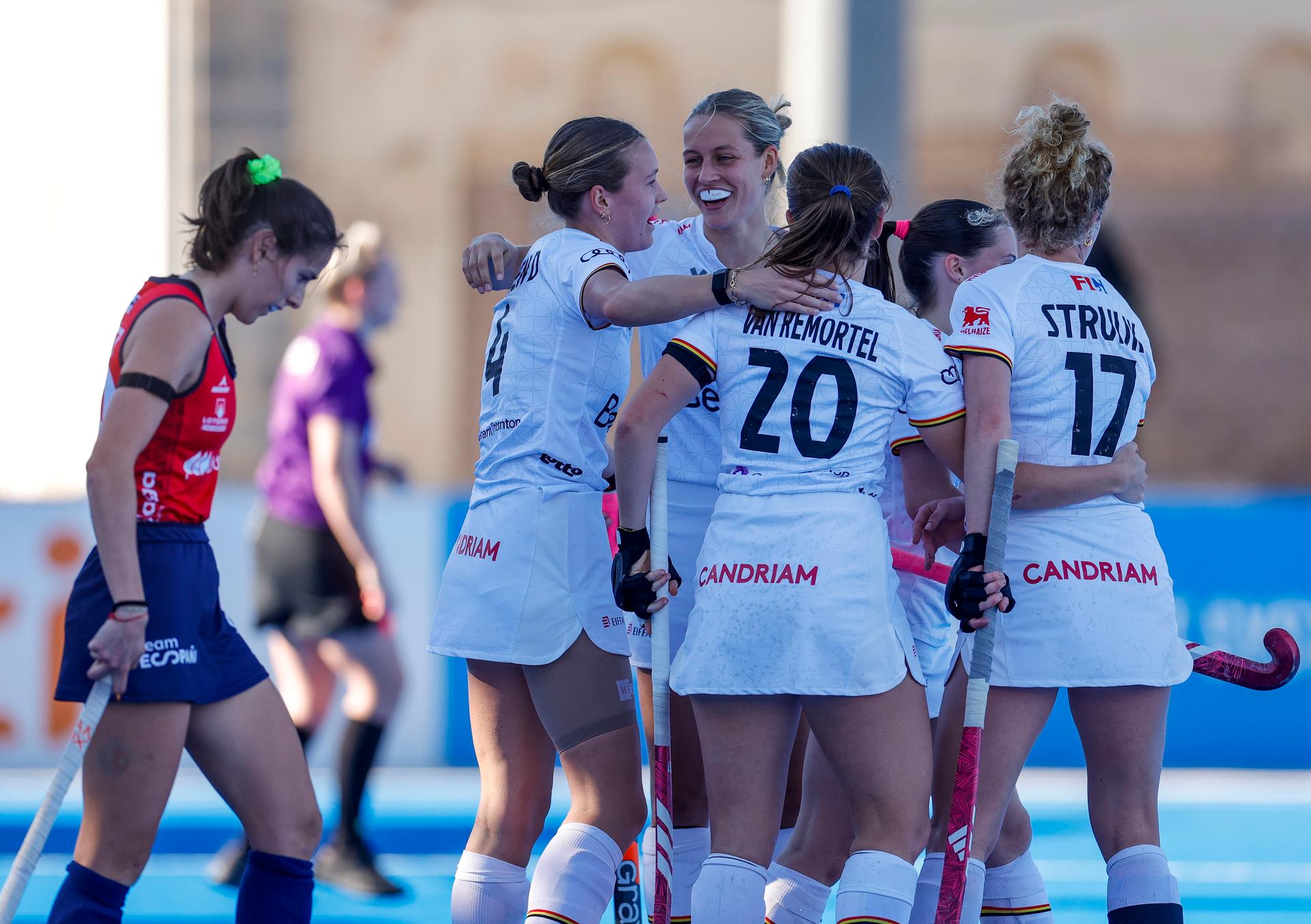 Belgium's Delphine Marien (R), Belgium's Alexi Van Remortel (C) and Belgium's Michelle Struijk (R) celebrate after scoring a goal at a hockey game between Belgian national team Red Panthers and Spain, The fifth game (out of 16) in the group stage of the 2025-2026 women's FIH Pro League, Thursday 05 February 2026 in Valencia, Spain. BELGA PHOTO DAVID GONZALEZ