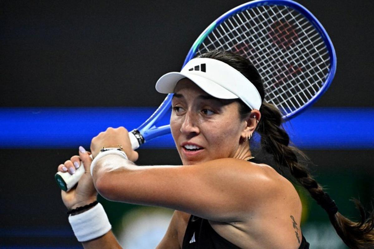USA's Jessica Pegula hits a return to Ukraine's Marta Kostyuk during their women's singles match at the China Open tennis tournament in Beijing on October 1, 2025. Pedro Pardo / AFP
