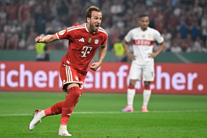Bayern Munich's English forward #09 Harry Kane celebrates scoring the 3-0 goal from the penalty spot during the German Cup (DFB Pokal) final football match FC Bayern Munich v VfB Stuttgart at the Olympic Stadium in Berlin, on May 23, 2026. Tobias SCHWARZ / AFP