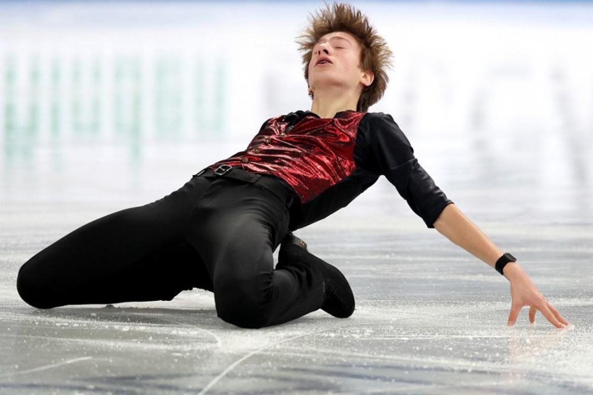 Belgium's Denis Krouglov competes in the Junior Men Short Program at the ISU Grand Prix of Figure Skating Final in Nagoya on December 4, 2025. PAUL MILLER / AFP