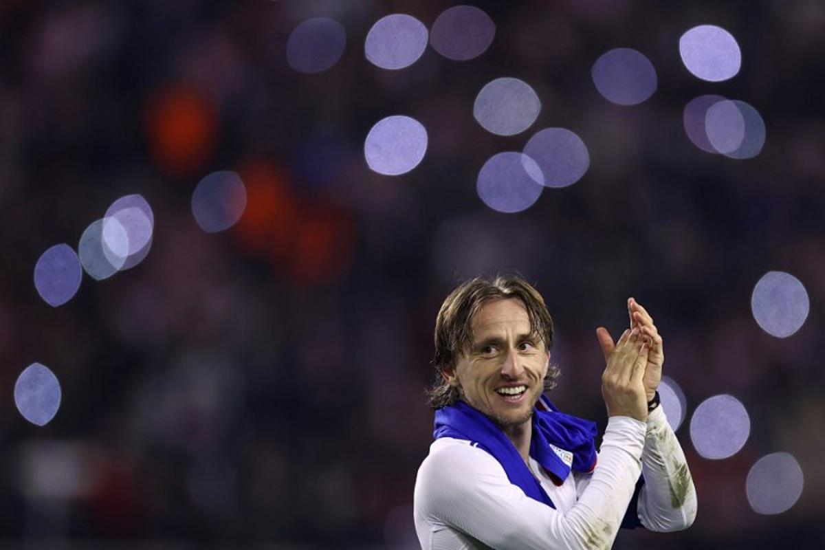 Croatia's midfielder #10 Luka Modric celebrates after winning the UEFA Nations League quarter-final first-leg football match between Croatia and France at the Poljud Stadium in Split, on March 20, 2025. FRANCK FIFE / AFP