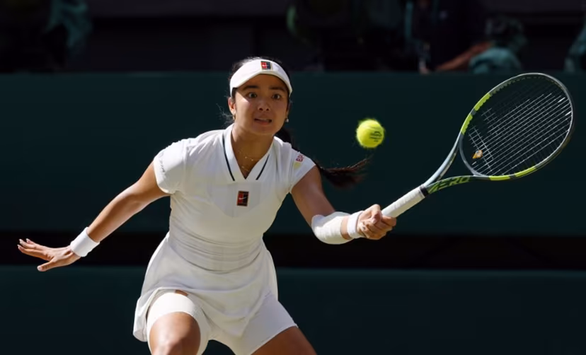 Philippines' Alexandra Eala returns to Italy's Jasmine Paolini during their women's singles round of 16 tennis match on the eighth day of the 2026 Wimbledon Championships at The All England Lawn Tennis and Croquet Club in Wimbledon, southwest London, on July 6, 2026. Adrian Dennis / AFP